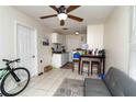 Bright and airy living space with tile floors, offering an open layout and great natural light at 1142 7Th Nw St, Largo, FL 33770