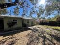 A spacious backyard featuring a lawn and patio, ideal for outdoor relaxation and entertaining at 2221 York S St, Gulfport, FL 33707