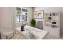 Well-lit home office with a modern desk, comfortable chair, built-in bookshelf, and pleasant outdoor view at 2245 Sienna Spruce St, Wesley Chapel, FL 33543