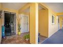 Welcome to this inviting condo featuring a charming porch area with lovely tile floors and a bright, cheerful atmosphere at 1125 Pinellas Bayway S # 103, Tierra Verde, FL 33715