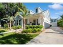 A charming home showcasing professional landscaping and inviting curb appeal at 790 36Th N Ave, St Petersburg, FL 33704