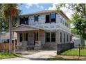 New construction home exterior featuring visible construction with wrapped windows, masonry and a covered entry at 1435 17Th N Ave, St Petersburg, FL 33704
