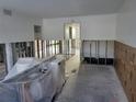Renovation project with exposed framing, updated electrical, and potential for customization at 4885 1St Ne St # 110, St Petersburg, FL 33703