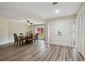 Spacious entryway featuring tile floors and a decorative double door at 6703 Towhe Dr, Seffner, FL 33584