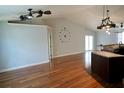Open living room featuring hardwood floors, high ceilings and lots of natural light at 2841 S Cranberry Blvd, North Port, FL 34286