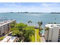 Expansive waterfront view from condo showcasing the sparkling blue ocean and surrounding cityscape at 30 Turner St # 704, Clearwater, FL 33756