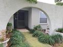 Entrance to a home displaying the walkway and design at 3200 Sandy Ridge Dr, Clearwater, FL 33761