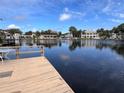 Enjoy this waterfront view of the neighborhood from your private dock, perfect for relaxing and entertaining at 5445 Manatee Point Dr, New Port Richey, FL 34652