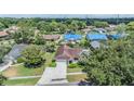 Spacious single Gathering home from above, located in a quiet residential neighborhood at 6436 Huntington Dr, Zephyrhills, FL 33542