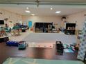 Inviting interior featuring neutral walls, carpet, commercial lighting, and functional learning spaces at 2624 54Th S St, Gulfport, FL 33707