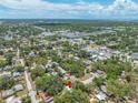 Aerial view of neighborhood, showcasing the home's location near local amenities and lush landscapes at 612 Sw Beverly Ave, Largo, FL 33770
