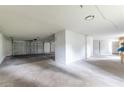 Spacious three car garage with ample room for vehicles and storage at 6521 Oelsner St, New Port Richey, FL 34652