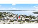 Beach house located near serene canals and picturesque waterfront views at 9760 Little Gasparilla Island, Placida, FL 33946