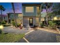 Charming two-story condo featuring a private entrance, updated landscaping, and well-maintained exteriors at 1028 Apollo Beach Blvd # 21, Apollo Beach, FL 33572