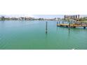 Expansive water view showcases the serene bay and a private dock, perfect for waterfront living at 31 Dolphin Dr, Treasure Island, FL 33706