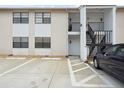 Exterior shot showing parking and unit access to building with stairs on multi-level at 3102 W Horatio St # 13, Tampa, FL 33609