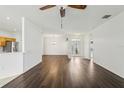 Bright living room features hardwood floors, fresh paint, and lots of natural light at 3311 Stonebridge Trl, Valrico, FL 33596