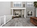 Inviting outdoor patio with a comfortable seating area and tiled flooring, perfect for relaxing or entertaining at 800 S Dakota Ave # 241, Tampa, FL 33606