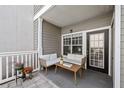 Cozy patio with seating and a table, offering a pleasant outdoor space to enjoy the fresh air at 800 S Dakota Ave # 241, Tampa, FL 33606