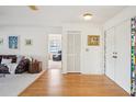 Inviting living room with hardwood floors and natural light at 1972 Wolf Laurel Dr, Sun City Center, FL 33573