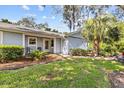Quaint home with mature tree in yard at 39650 Us Highway 19 N # 553, Tarpon Springs, FL 34689