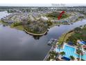 Waterfront property in Tampa Bay with community pool, dock, and water access at 5413 Wishing Arch Dr, Apollo Beach, FL 33572