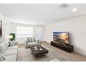 Comfortable living room with natural light and stylish decor at 6025 Shore S Blvd # 409, Gulfport, FL 33707