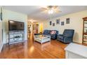 Bright and airy living room with hardwood floors and an open layout at 2308 Rio Cir, Spring Hill, FL 34608