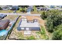 Aerial view of a new home foundation in a residential area, showing the layout and construction progress at 27017 Mott Ave, Brooksville, FL 34602
