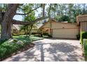 Charming home featuring mature landscaping and neutral paint scheme at 3071 Bolt Dr, Palm Harbor, FL 34685