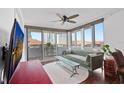 Comfortable living room with balcony access offering city views, perfect for relaxing and entertaining at 470 3Rd S St # 602, St Petersburg, FL 33701