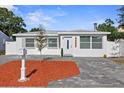Charming single-story home with a well-maintained front yard and paver driveway, newly renovated at 5405 59Th N St, St Petersburg, FL 33709