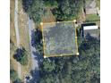 Aerial view of the property outlined in yellow at 8601 N 28Th St, Tampa, FL 33604