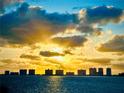 Beautiful sunset view featuring a dramatic skyline over the water, creating a tranquil and breathtaking scene at 100 Oakmont Ln # 310, Belleair, FL 33756