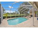Inviting screened-in pool area with lounge chairs, perfect for relaxation and outdoor enjoyment at 2713 Brianholly Dr, Valrico, FL 33596