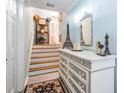 Entryway with dresser and stairway at 4509 S Cortez Ave, Tampa, FL 33611