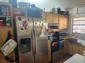 Functional kitchen with stainless steel refrigerator and appliances; ample cabinet storage at 10539 Parkcrest Dr, Tampa, FL 33624