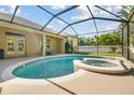 Screened-in pool and spa with a spacious deck for outdoor entertaining and lounging at 1116 Hillandale Reserve Dr, Tampa, FL 33613