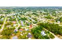Aerial view showcases the home's location within a lush, green neighborhood at 13216 Antelope St, Spring Hill, FL 34609