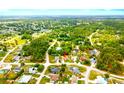 Aerial view shows the property's location within a green residential area, close to community features at 13216 Antelope St, Spring Hill, FL 34609