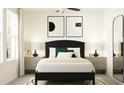Serene bedroom featuring a padded headboard bed, contemporary décor, and stylish nightstands at 1806 Tropical Oasis Ave, Plant City, FL 33565