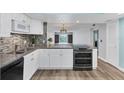 Well-lit kitchen with stylish countertops and stainless steel appliances at 4904 38Th S Way # 514, St Petersburg, FL 33711