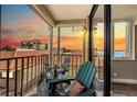 Balcony view with a table and chairs, perfect for relaxing at 6158 Palma Del Mar S Blvd # 306, St Petersburg, FL 33715