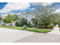 Beautiful two-story home featuring a well-maintained lawn and lush landscaping for added curb appeal at 795 26Th N Ave, St Petersburg, FL 33704