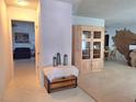 Inviting entryway featuring tile floors and an open concept living space at 1291 Stony Brook Ln, Dunedin, FL 34698