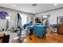 Bright living room with hardwood floors, showcasing an open layout and an abundance of natural light at 3008 Jackson N St, St Petersburg, FL 33704