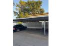 Convenient covered parking space for residents and guests, providing protection from the elements at 7601 W Deleon Ct, Tampa, FL 33615