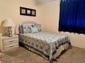 This charming bedroom offers a cozy space with decorative bedding and a serene atmosphere at 16330 Gulf Blvd # 201, Redington Beach, FL 33708