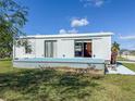 The exterior view shows a deck, offering a private outdoor living space at 4609 10Th Street E Ct, Ellenton, FL 34222