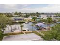 Waterfront homes with docks and boat houses along a canal and waterway at 6914 Harbor Dr, Hudson, FL 34667